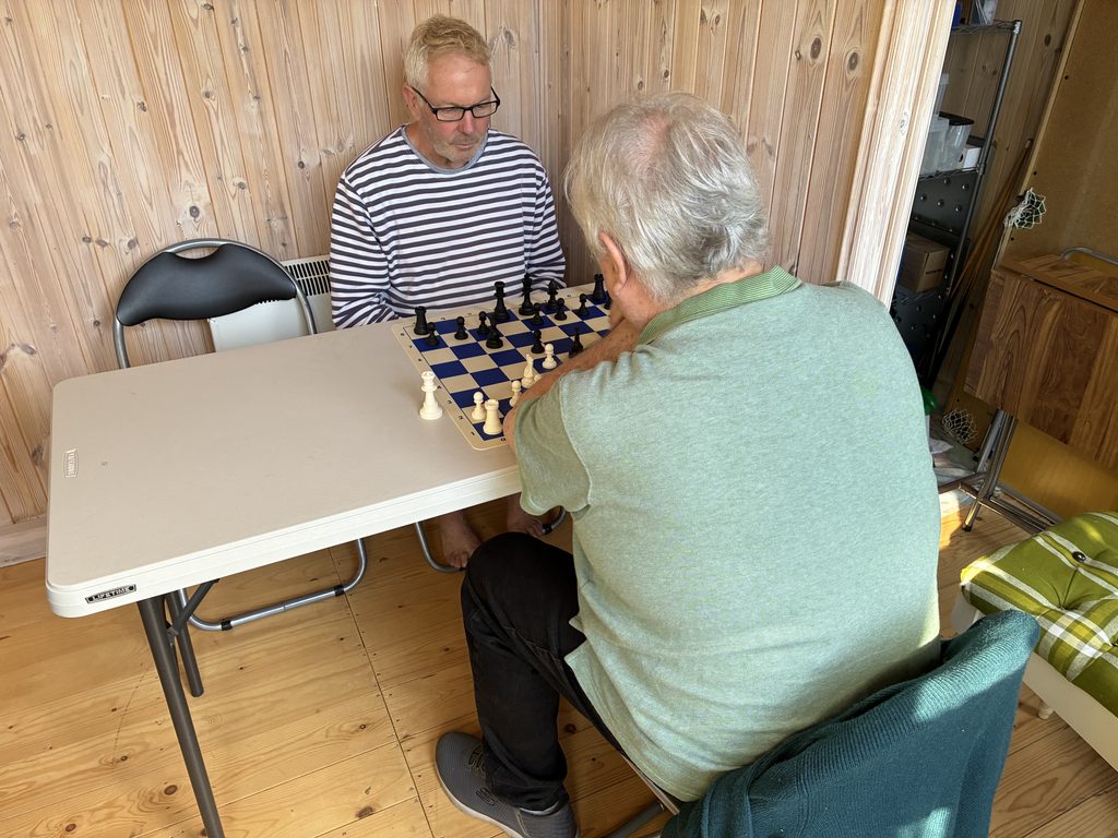 Two people playing Chess